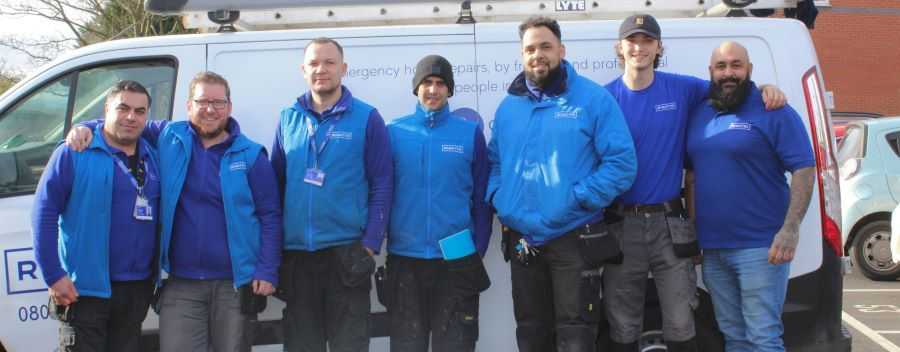Group of Male Engineers Stood in Front of a Rightio Branded Van All Wearing Rightio Uniform